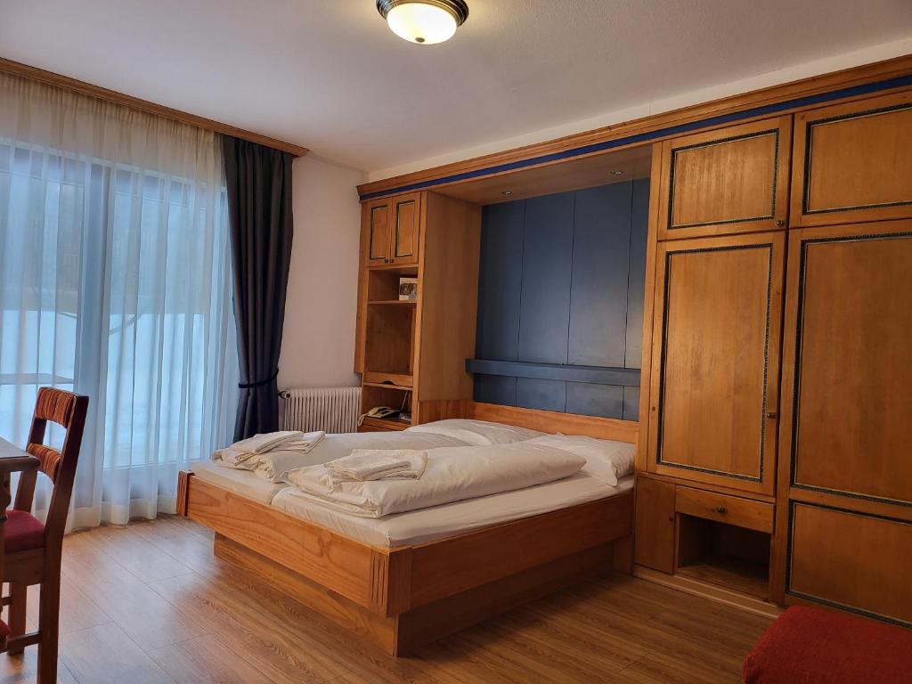 Postel nebo postele na pokoji v ubytování Gasthof Ramona