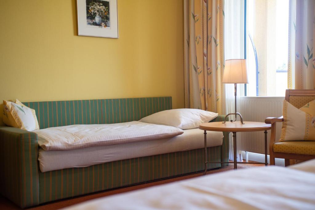Postel nebo postele na pokoji v ubytování GASTHOF SCHEER Feriendomizil