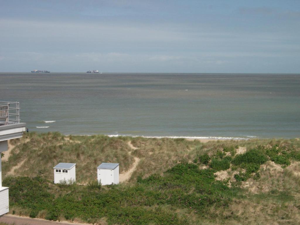 a view of the ocean from the balcony of a house at Zoutezoute in Knokke-Heist