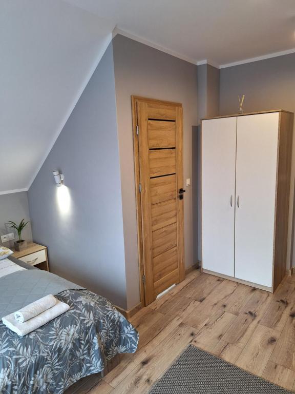 Apartamenty Dębowy Zakątek w Dolinie Baryczy - Tweepersoonskamer Met Terras