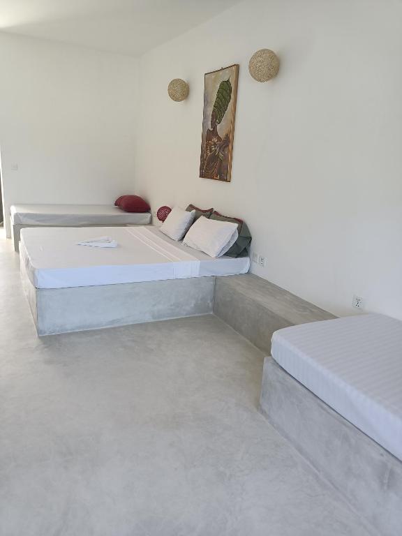Postel nebo postele na pokoji v ubytování Watamu Ascot Resort