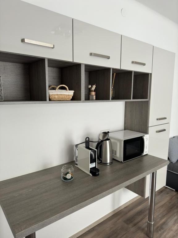 Kuchyň nebo kuchyňský kout v ubytování Apartment Vlora-Naturblick