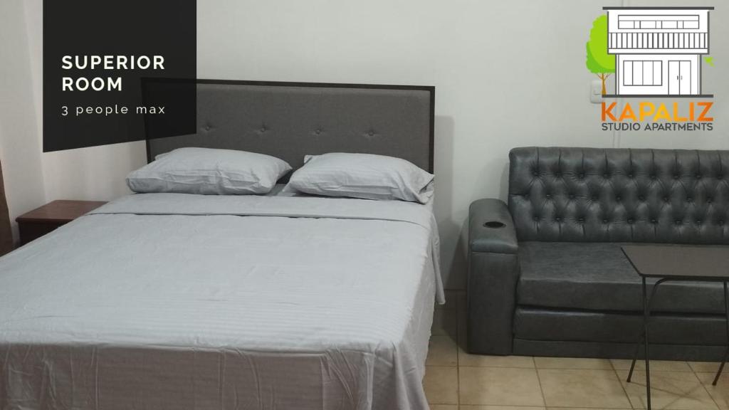 Postel nebo postele na pokoji v ubytování KAPALIZ