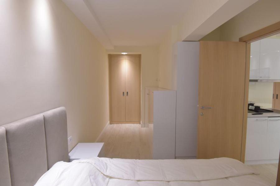 Postel nebo postele na pokoji v ubytování Konaci Kopaonik Lux Apartmani