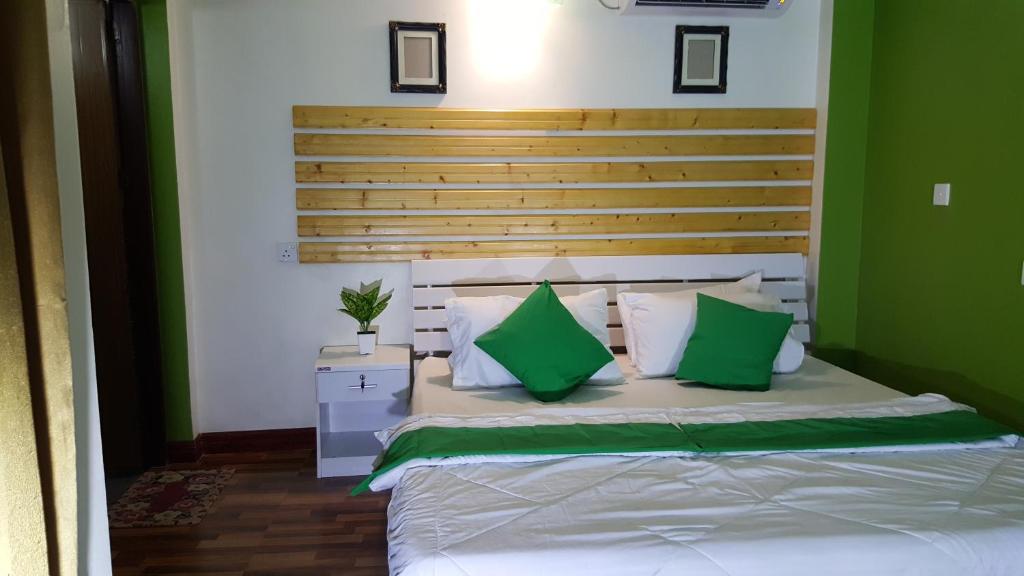 Postel nebo postele na pokoji v ubytování Finimas Residence