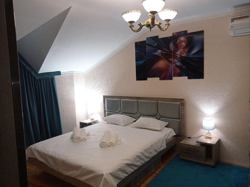 Ένα ή περισσότερα κρεβάτια σε δωμάτιο στο Next hotel Tashkent