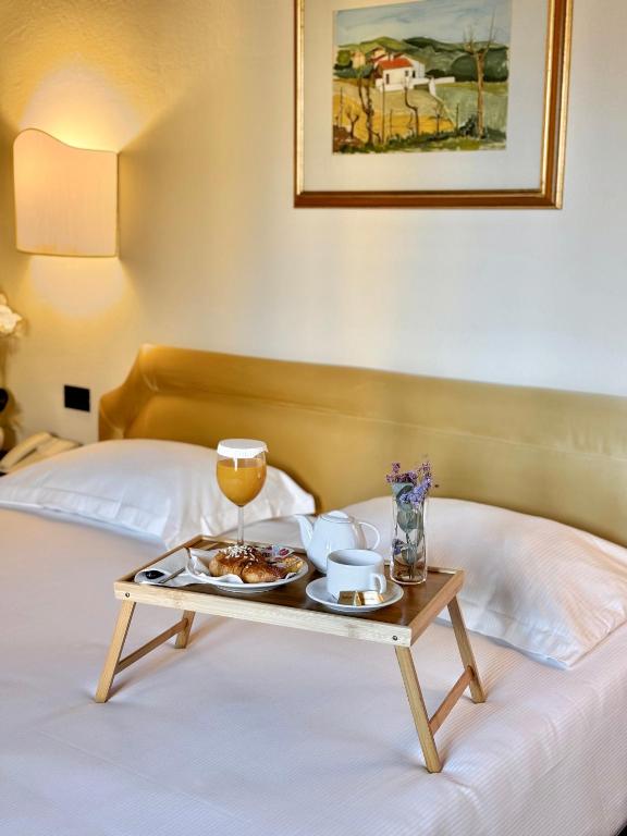 Postel nebo postele na pokoji v ubytování Hotel Relais Il Cestello