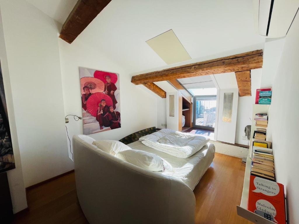 a living room with a couch and a bed at Palais Belle Epoque - Property With Style in Cannes