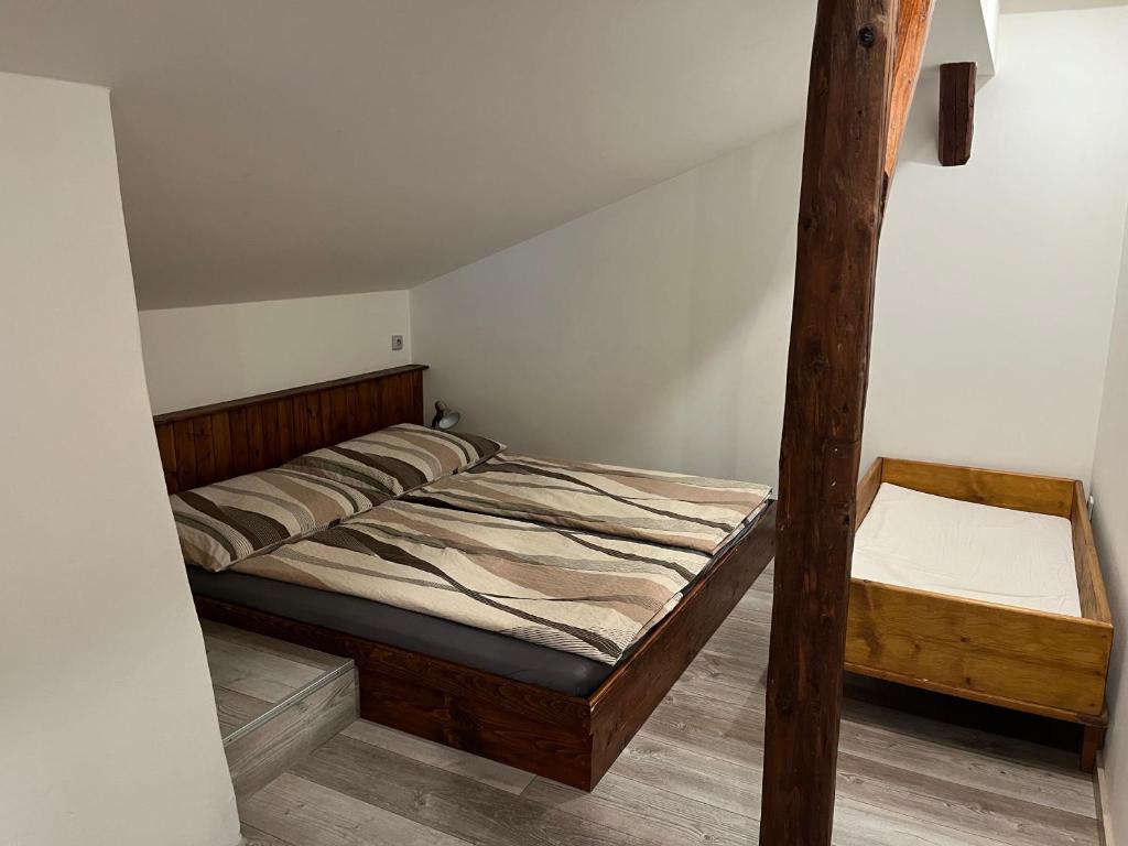Postel nebo postele na pokoji v ubytování Ubytování Monika