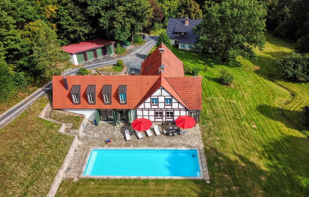 an aerial view of a house with a swimming pool at Amazing Home In Eiterfeld With Wifi in Eiterfeld