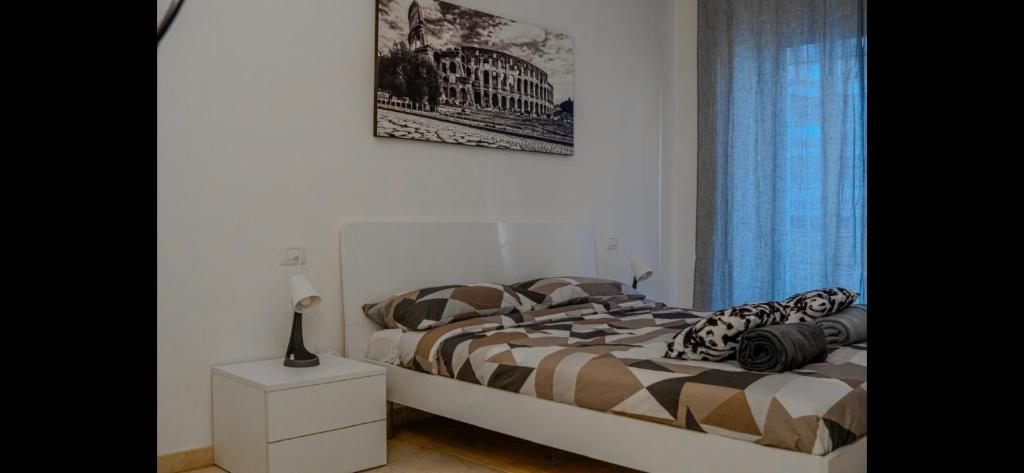 Ένα ή περισσότερα κρεβάτια σε δωμάτιο στο Monti Deluxe Apartment