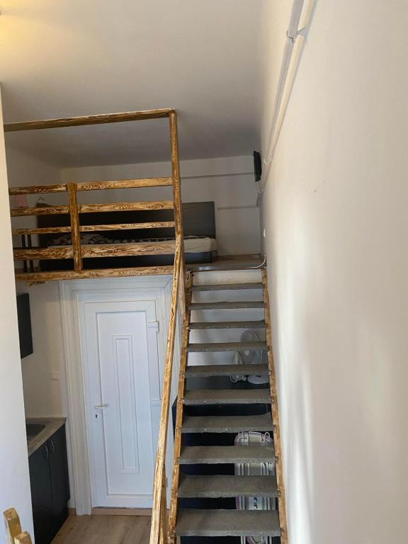 Poschodová posteľ alebo postele v izbe v ubytovaní SparrOwl Apartments