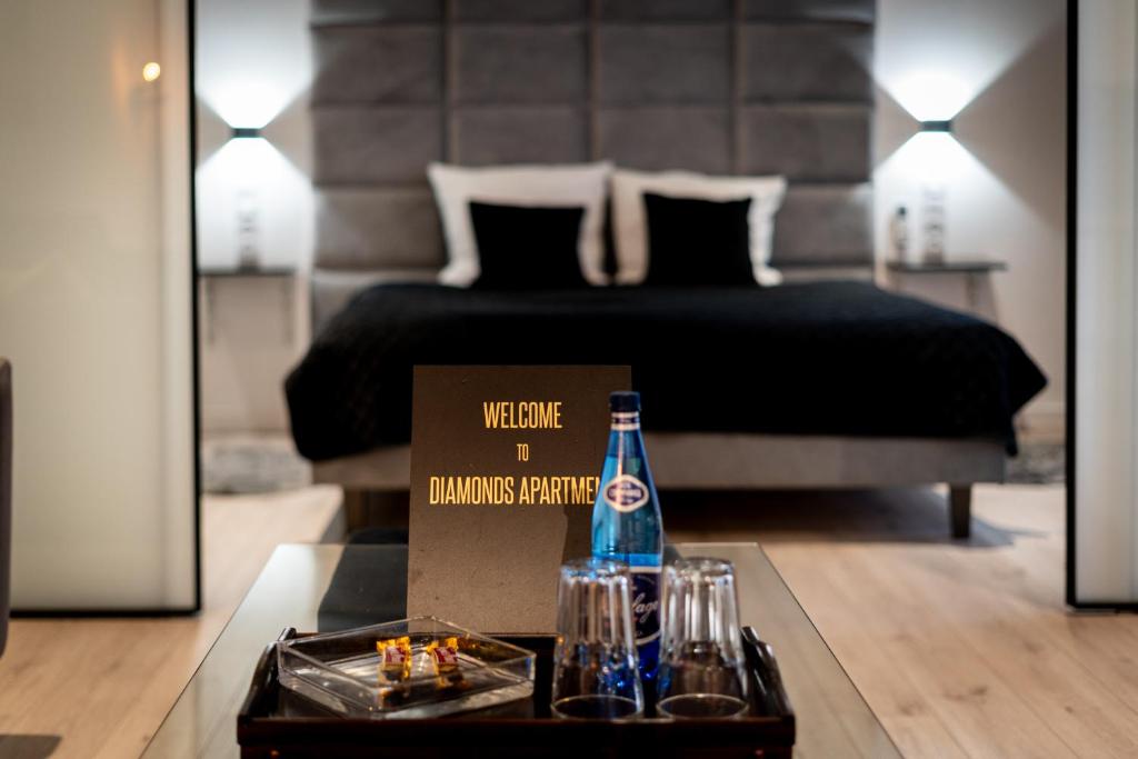 Posteľ alebo postele v izbe v ubytovaní Diamonds Apartment