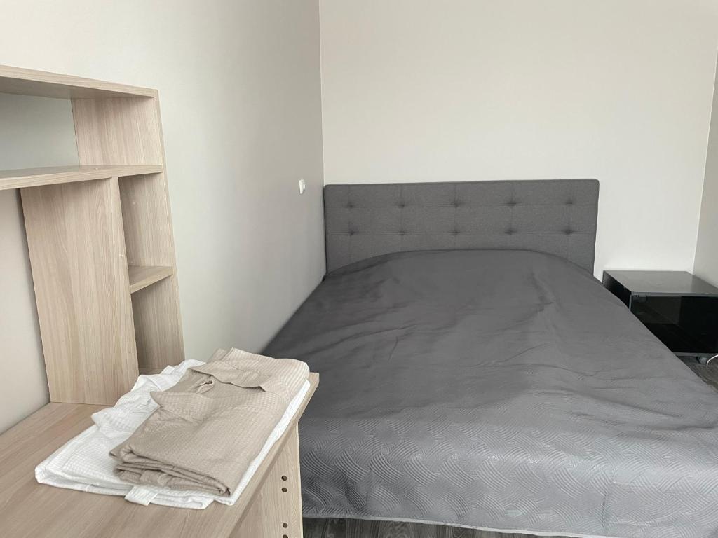 Postel nebo postele na pokoji v ubytování Vironia Apart