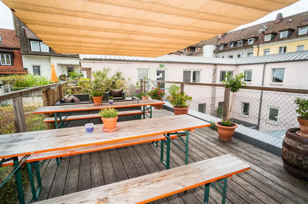 Balkón nebo terasa v ubytování Babelfish Hostel