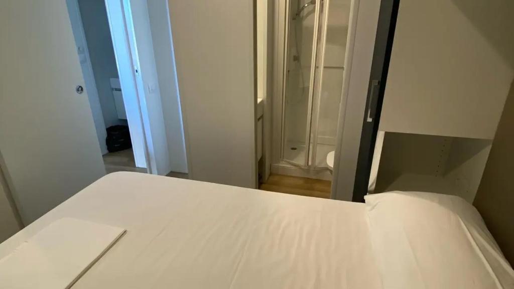 Postel nebo postele na pokoji v ubytování Camping Internazionale Di Castelfusano