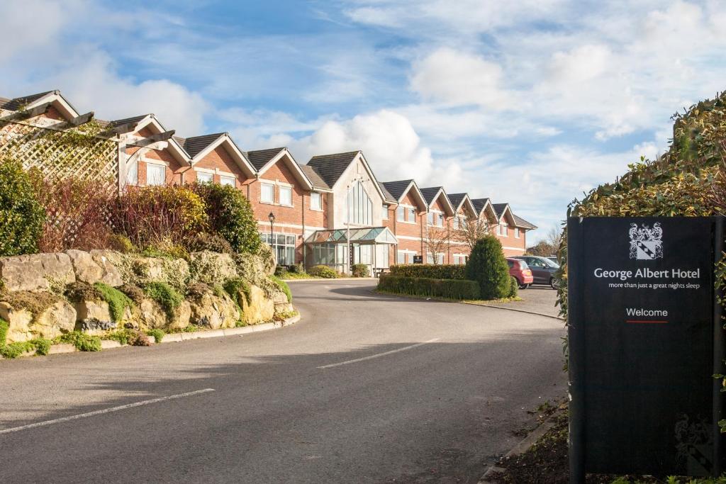 a street with a row of houses on a road at George Albert Hotel & Spa in Dorchester