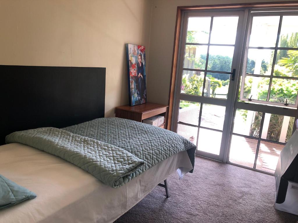 Postel nebo postele na pokoji v ubytování Horse Shoe Manor