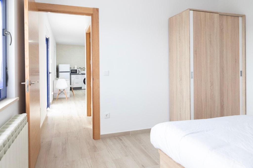 Postel nebo postele na pokoji v ubytování Las casinas de Piedralba