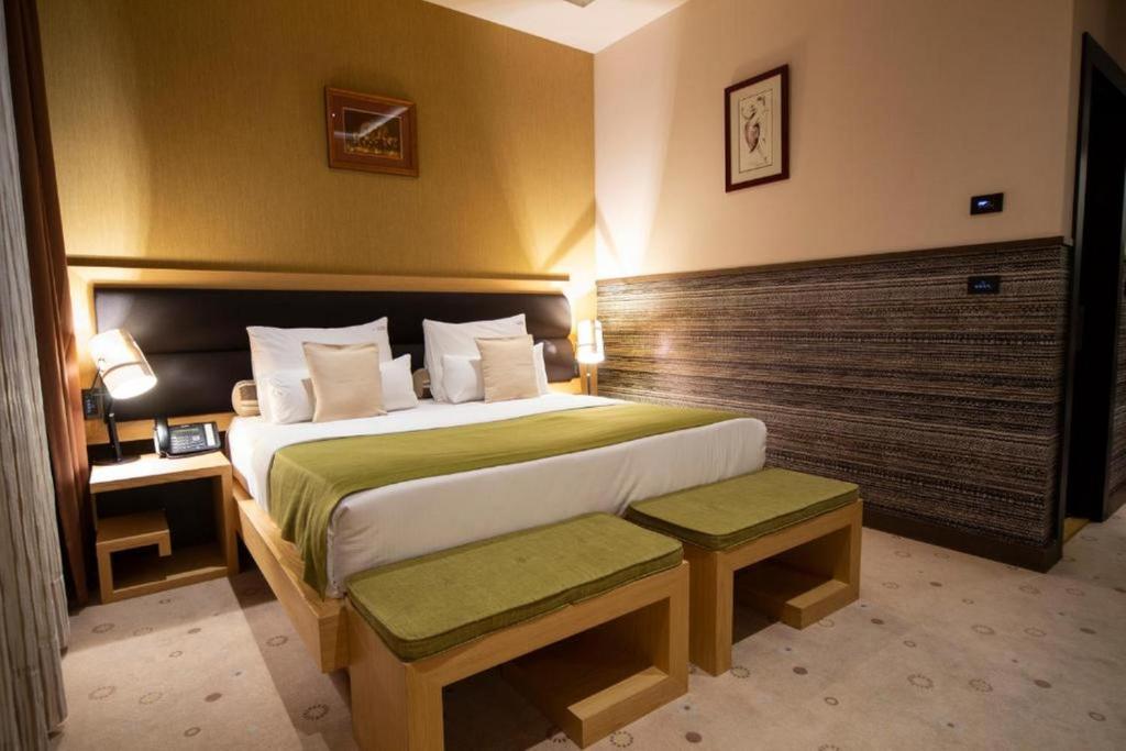 Postel nebo postele na pokoji v ubytování Atera Business Suites