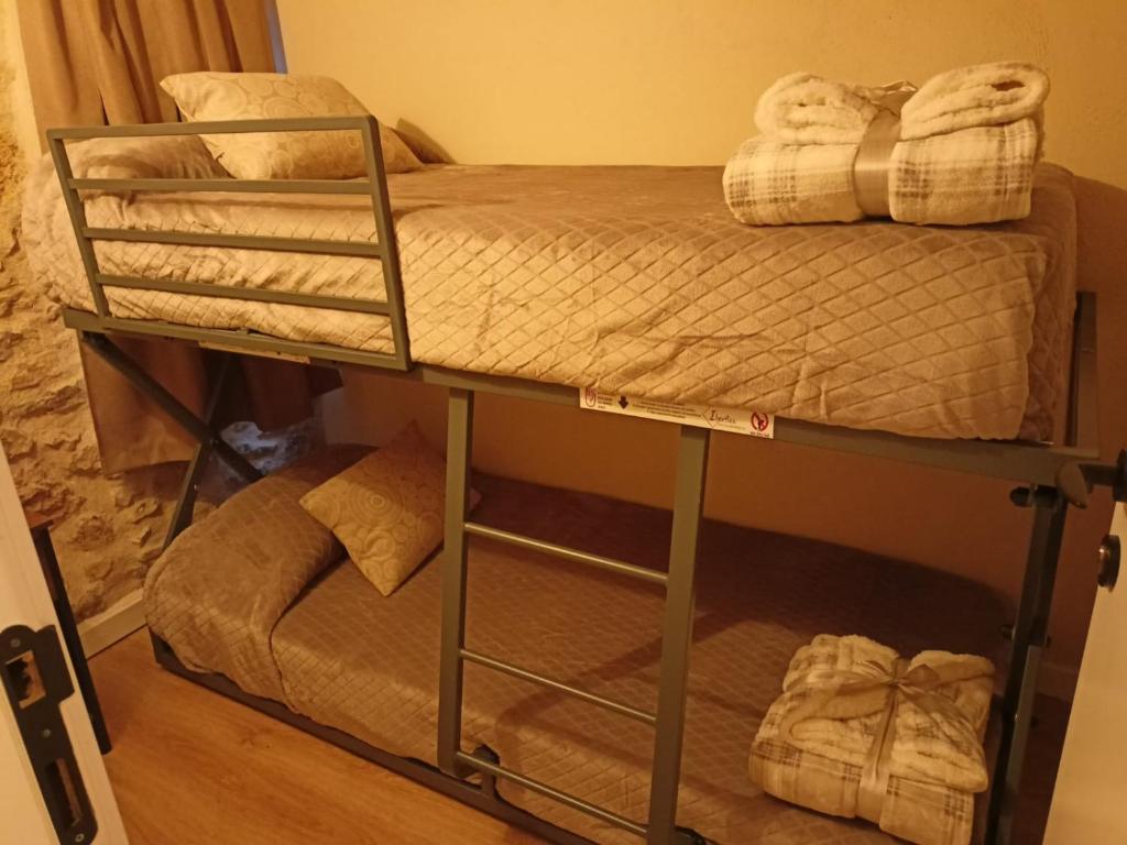 Postel nebo postele na pokoji v ubytování Cal Vientos