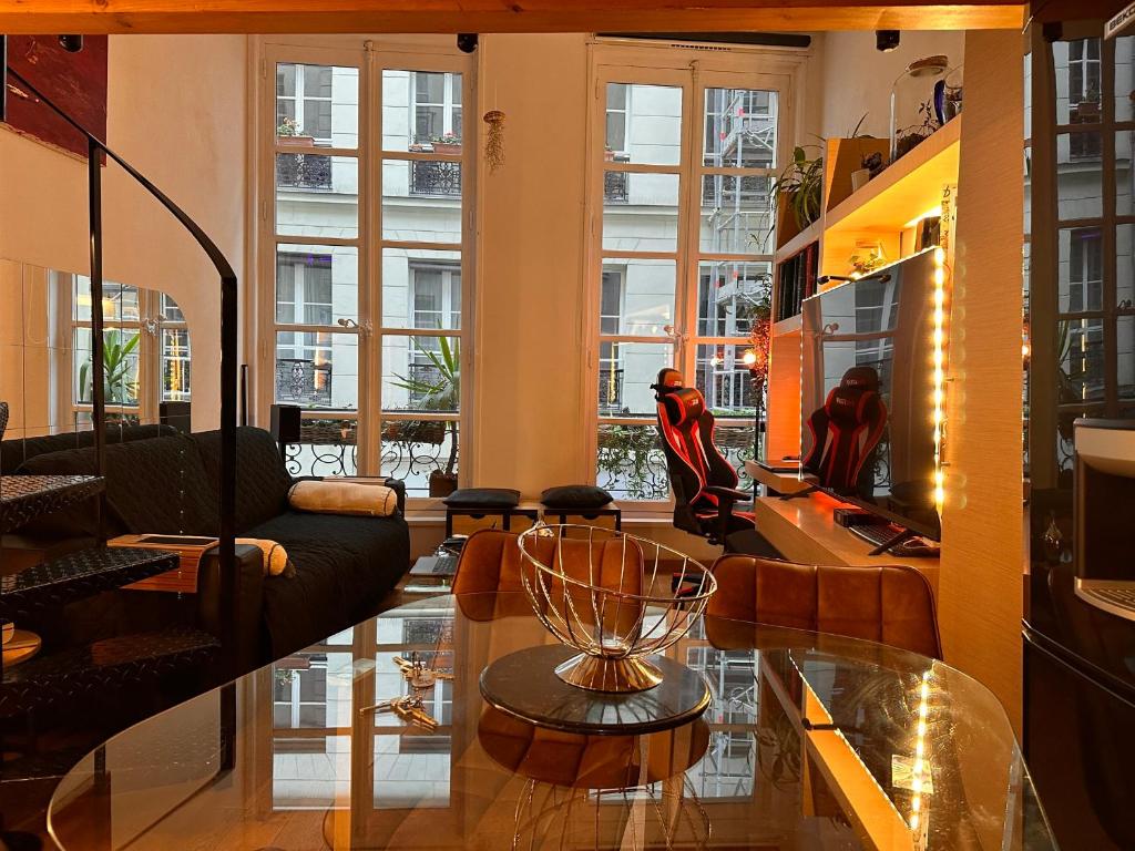 Posedenie v ubytovaní Magnifique studio au coeur du Marais