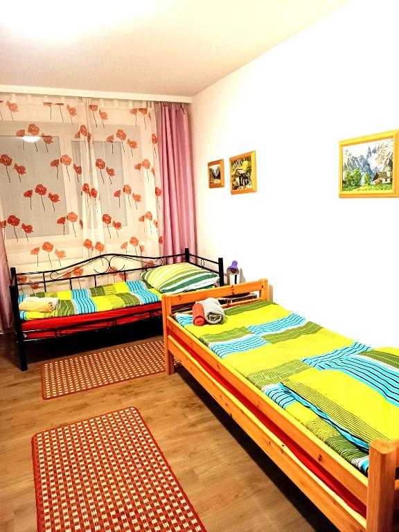 Postel nebo postele na pokoji v ubytování Hotel Zemlinski