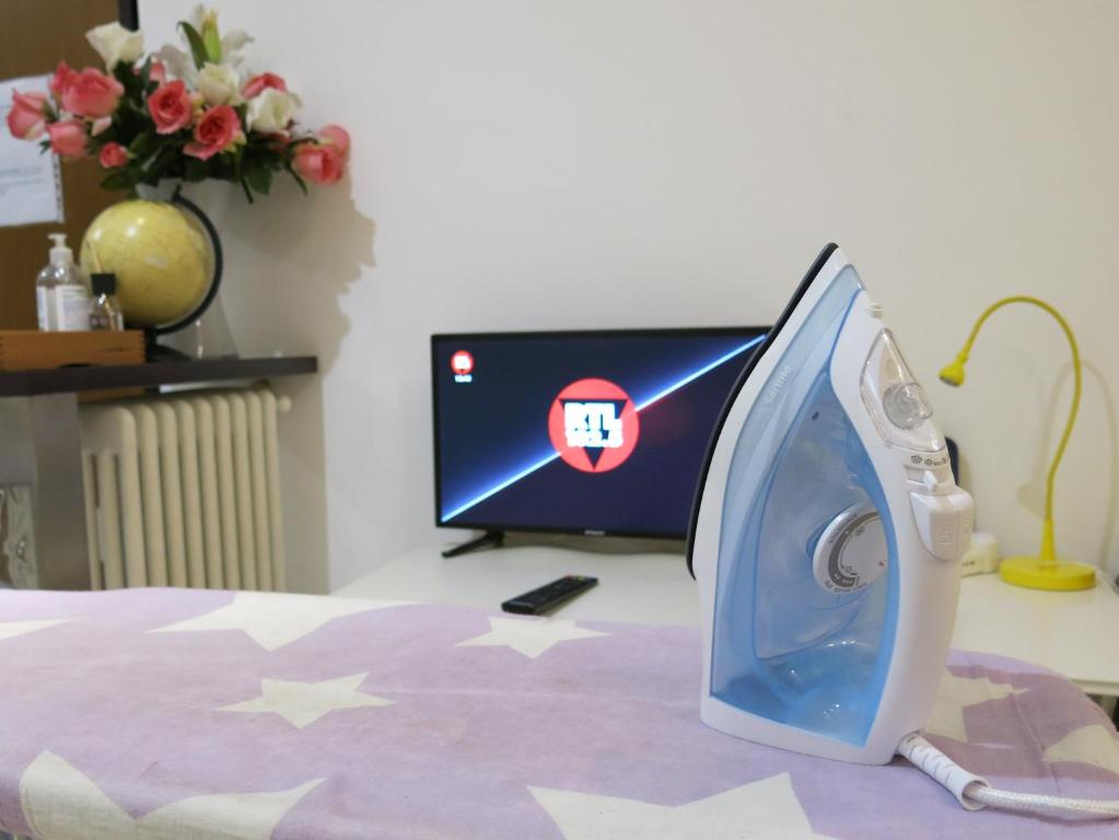 Televízia a/alebo spoločenská miestnosť v ubytovaní Thany casa