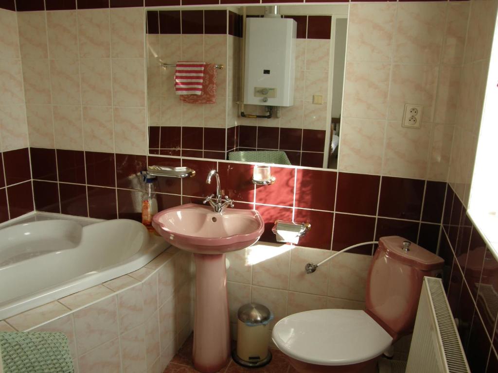 Koupelna v ubytování Hotel Garni