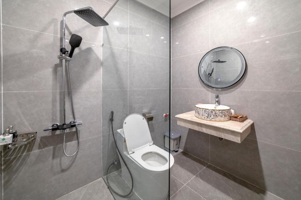 Koupelna v ubytování Savio Hotel Trieu Viet Vuong