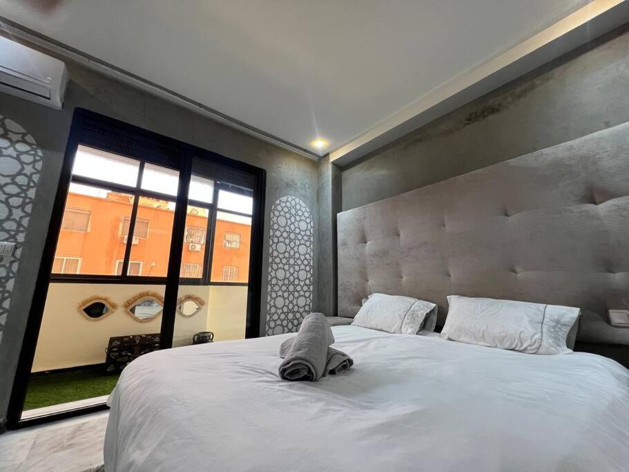 Postel nebo postele na pokoji v ubytování Appartement bien situé à Gueliz