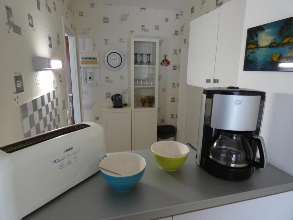 Kuchyňa alebo kuchynka v ubytovaní Appartement bord de mer à Notre Dame de Monts - 38m², 4 pers, animaux admis - FR-1-540-250