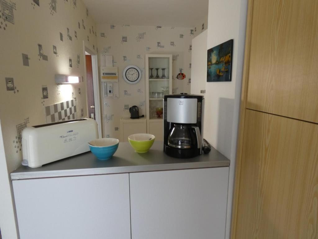 Kuchyňa alebo kuchynka v ubytovaní Appartement bord de mer à Notre Dame de Monts - 38m², 4 pers, animaux admis - FR-1-540-250