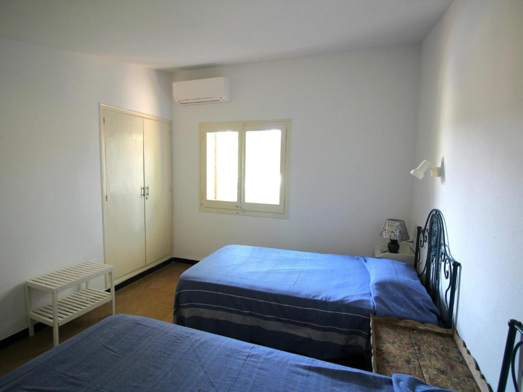 Postel nebo postele na pokoji v ubytování POMPEU FABRA - Apartamento luminoso a 300 m. de la playa de Grifeu. - ES-228-26