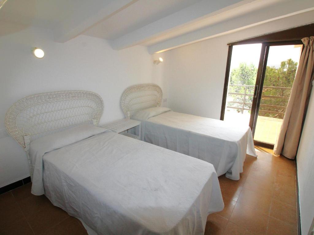 Postel nebo postele na pokoji v ubytování POMPEU FABRA - Apartamento luminoso a 300 m. de la playa de Grifeu. - ES-228-26