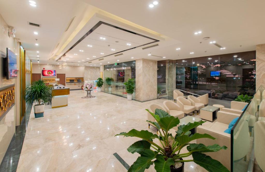 TV a/nebo společenská místnost v ubytování Grand Gosia Hotel