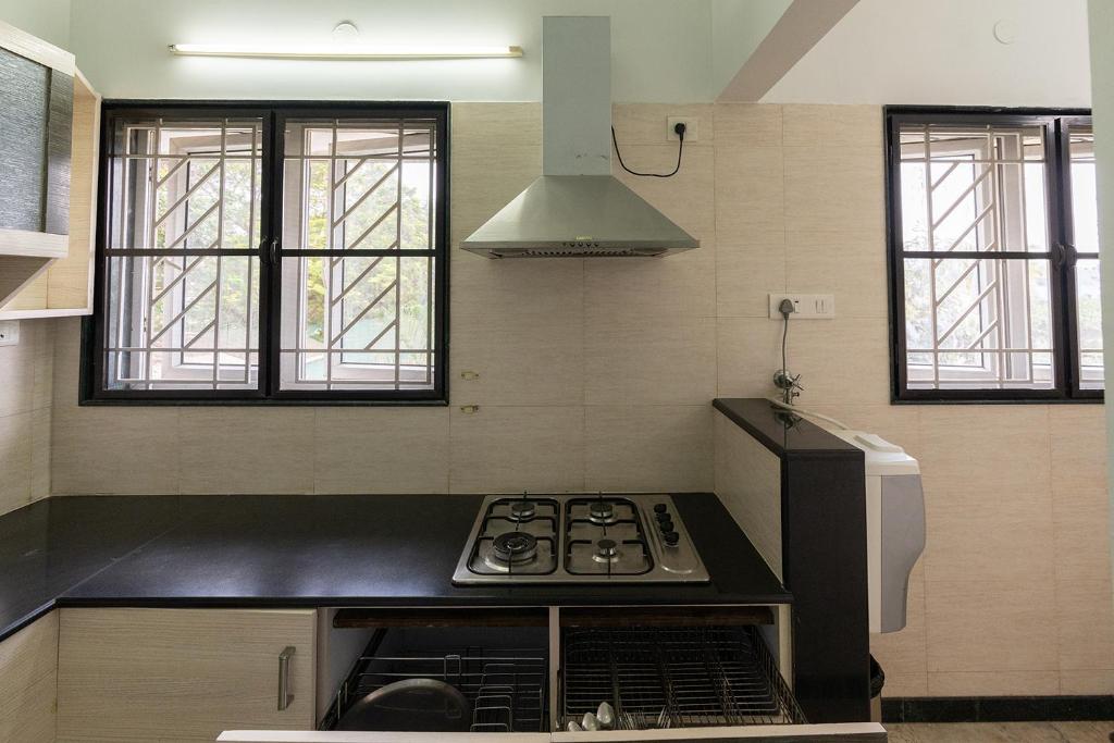 Kuchyň nebo kuchyňský kout v ubytování Hive Service Apartment