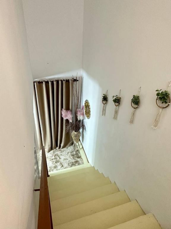 Postel nebo postele na pokoji v ubytování Amir Homestay
