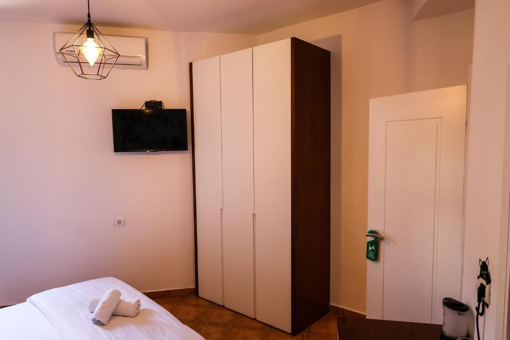 Postel nebo postele na pokoji v ubytování COSMO Beach Hotel