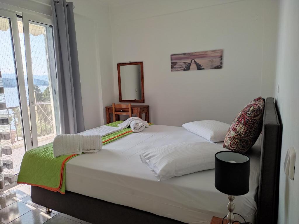 A bed or beds in a room at Korakias SeaView