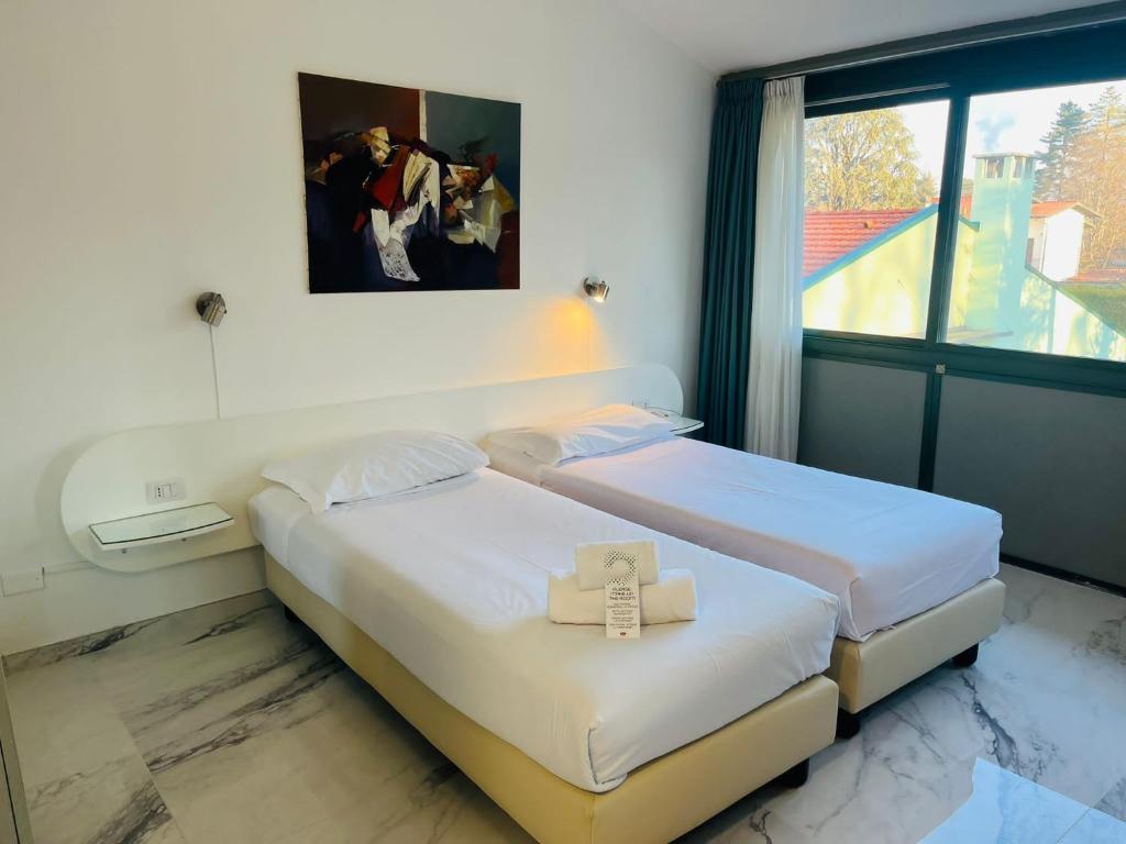 Postel nebo postele na pokoji v ubytování Green Hotel Motel