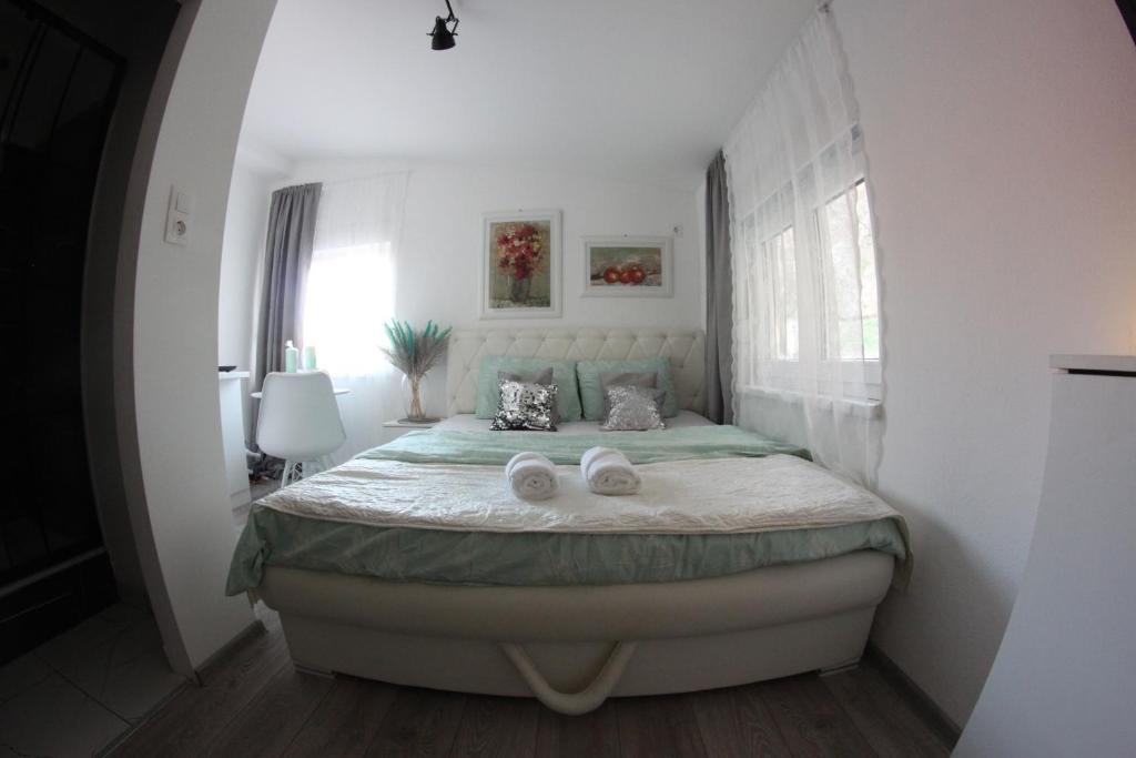 Postel nebo postele na pokoji v ubytování Hostel Nina Mostar