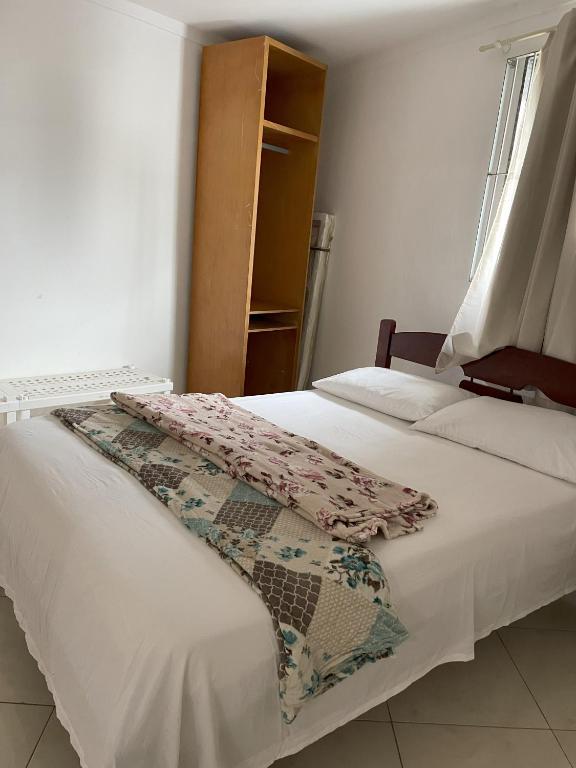 Postel nebo postele na pokoji v ubytování AP Família térreo 2 quartos