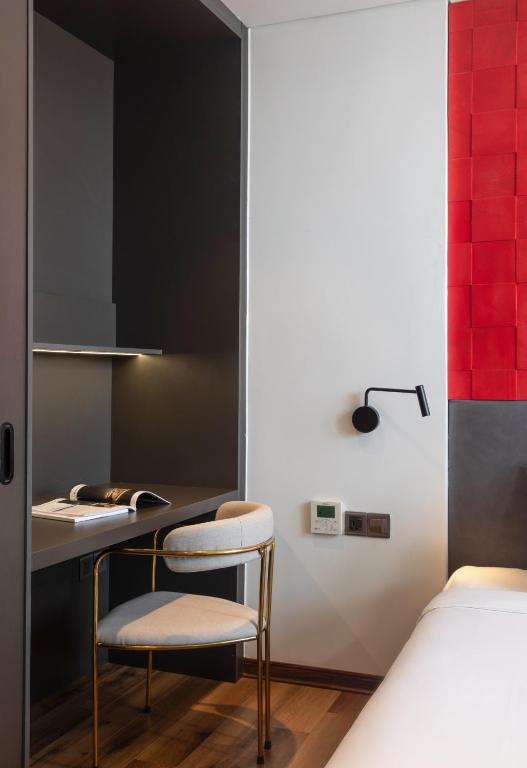 Giường trong phòng chung tại Taiyo Hotel & Apartment