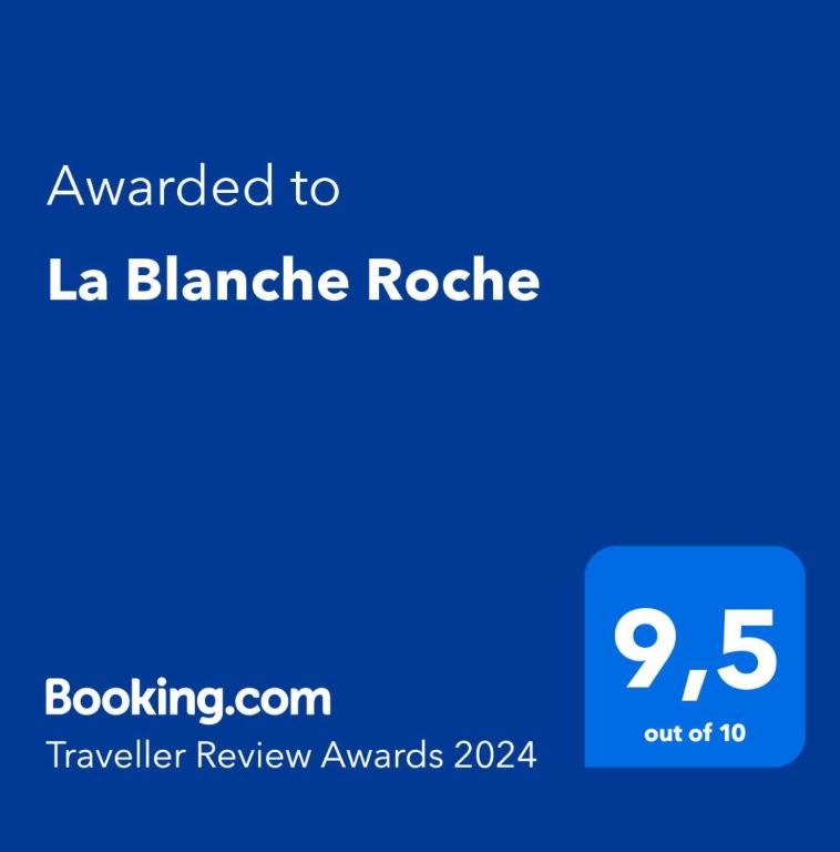 Et logo, certifikat, skilt eller en pris der bliver vist frem p&aring; La Blanche Roche
