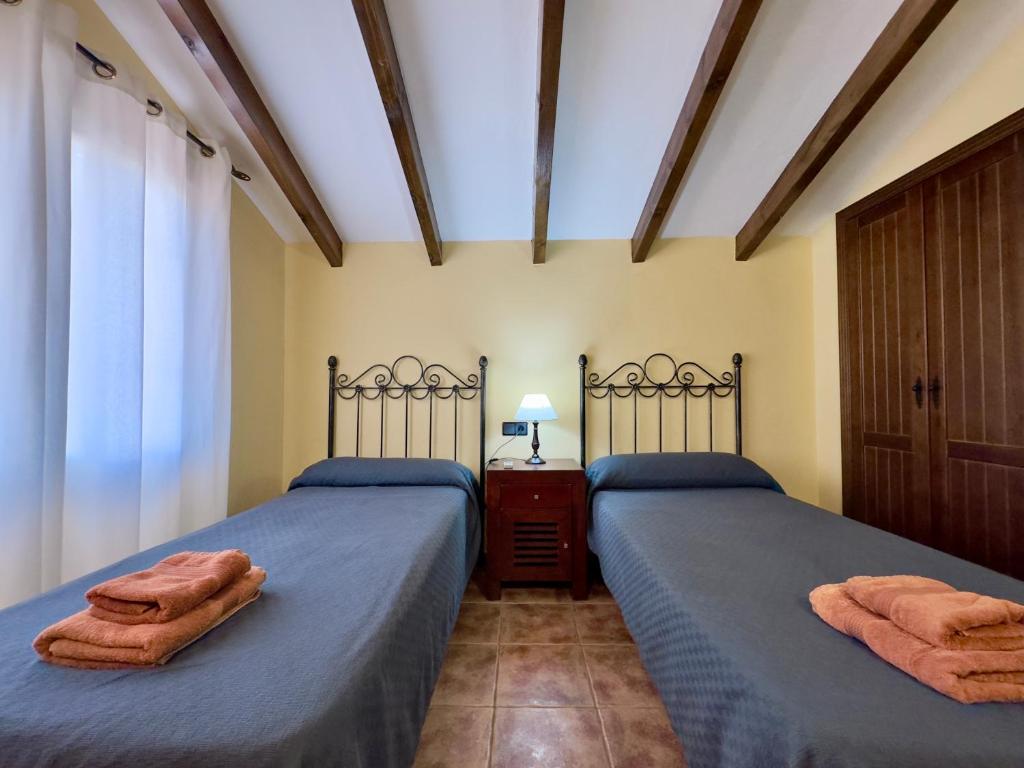 Posteľ alebo postele v izbe v ubytovaní Chalet El Parral - Piscina y Sala de Cine