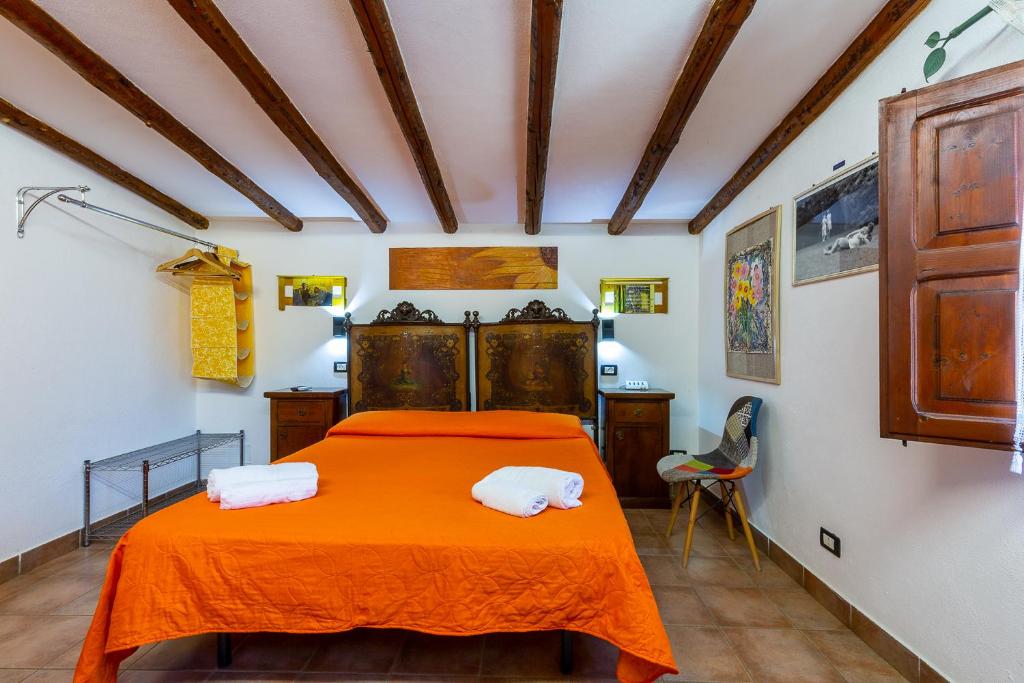 Postel nebo postele na pokoji v ubytování B&B Villa San Marco