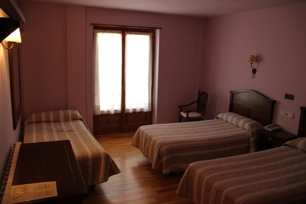 Postel nebo postele na pokoji v ubytování Hotel Rantiner