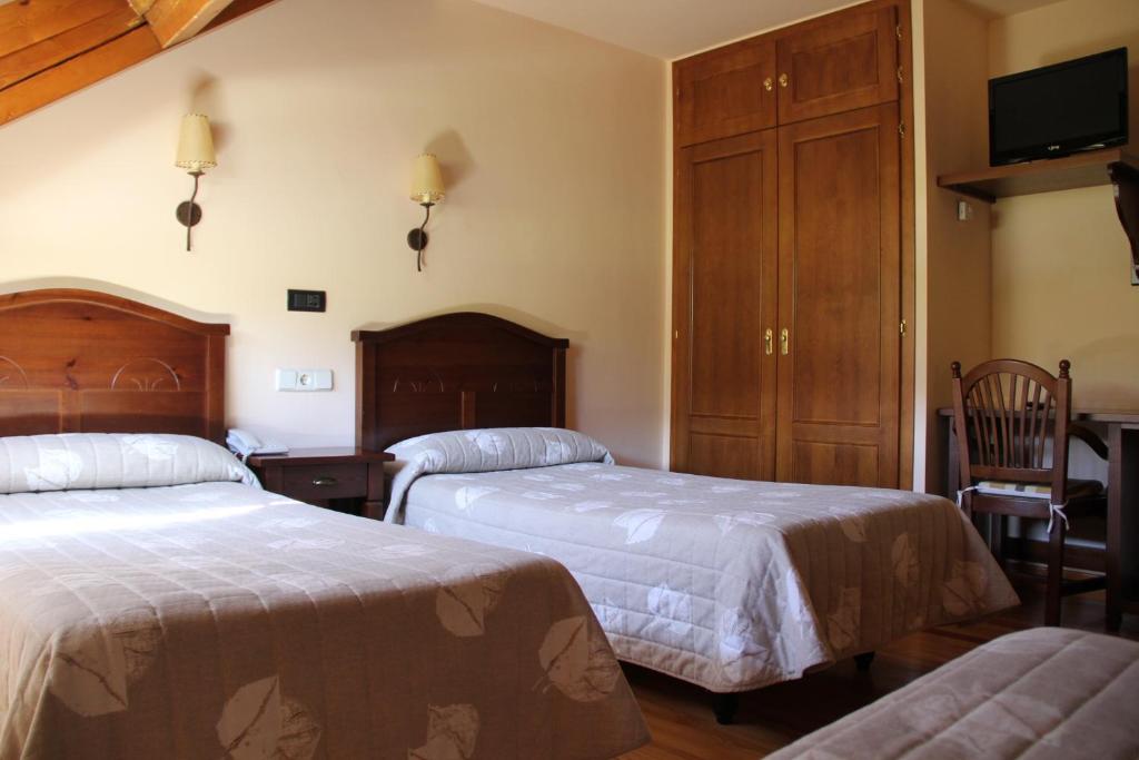 Postel nebo postele na pokoji v ubytování Hotel Rantiner