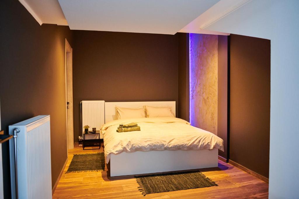 Postel nebo postele na pokoji v ubytování The Skyline Suite